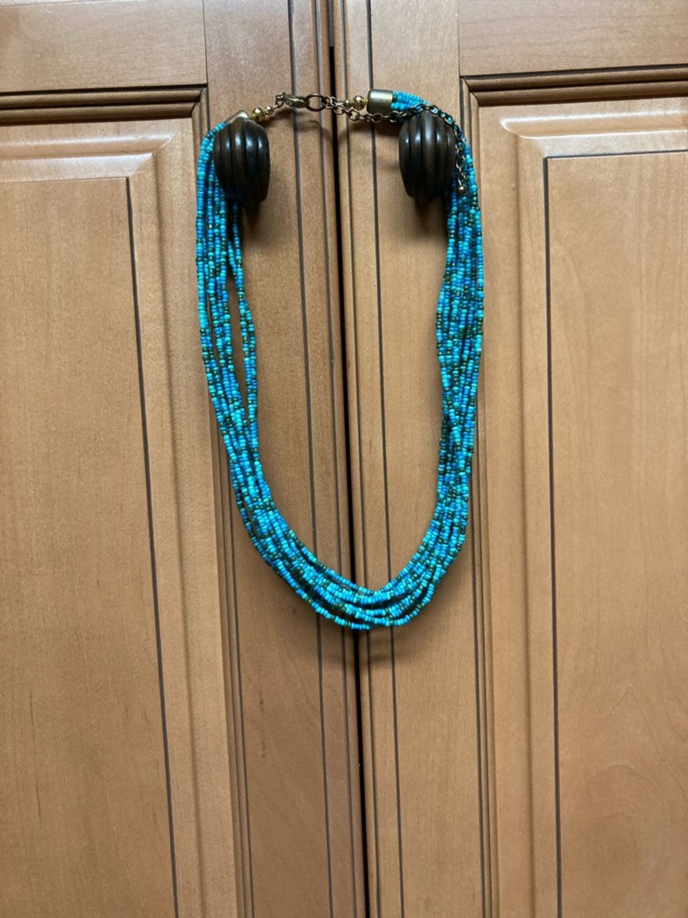 Multi-Strand Turquoise Beaded Necklace with Dark Bead Accents